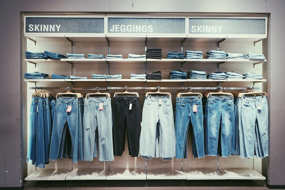 Clean denim garments on a rack