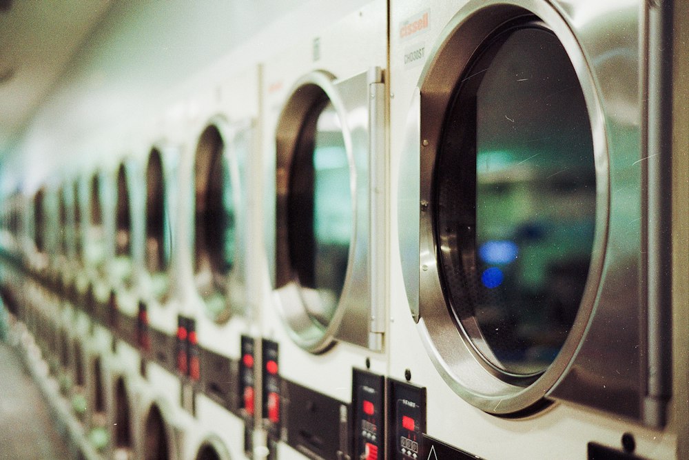 Row of professional laundry dryers